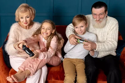 front view grandparents playing video games with their grandchildren 23 2148425194 6759e48e1ef0c