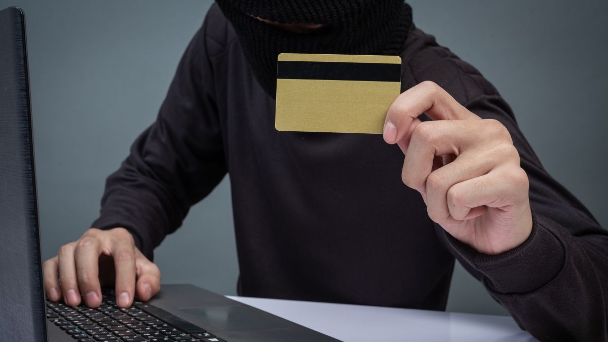 thieves hold credit cards using laptop computer password hacking activities