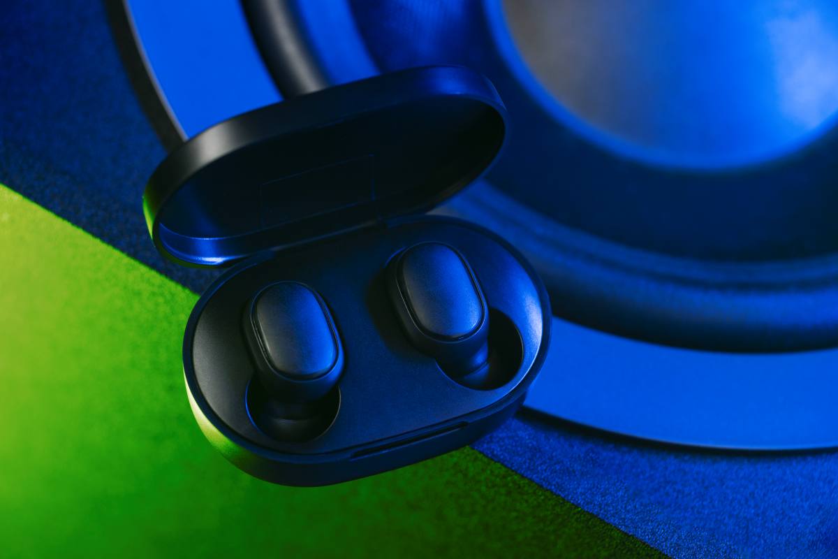 wireless earbuds with neon cyberpunk style lighting