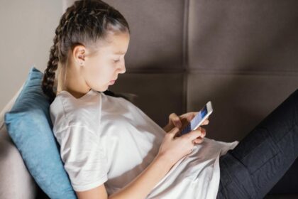 young girl using mobile