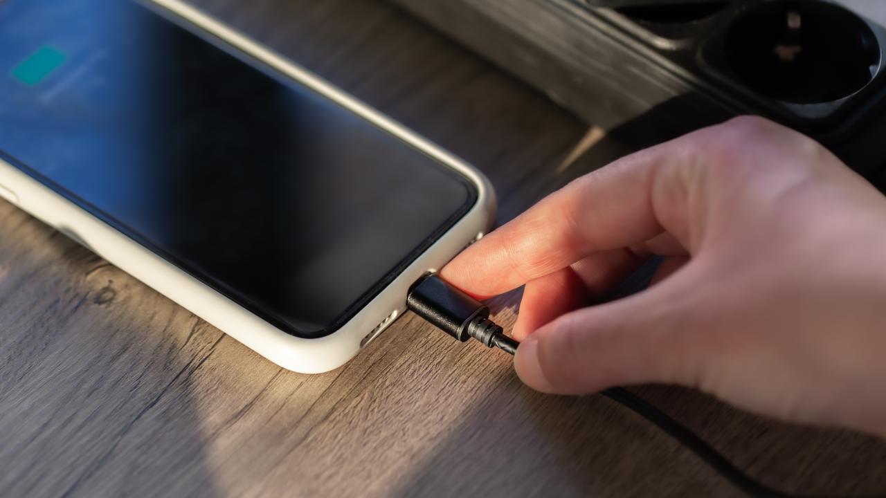 magnetic cable charging smartphone close up
