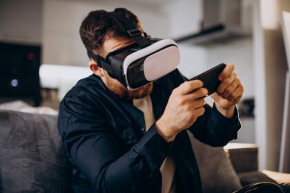 man sitting home using vr (1)