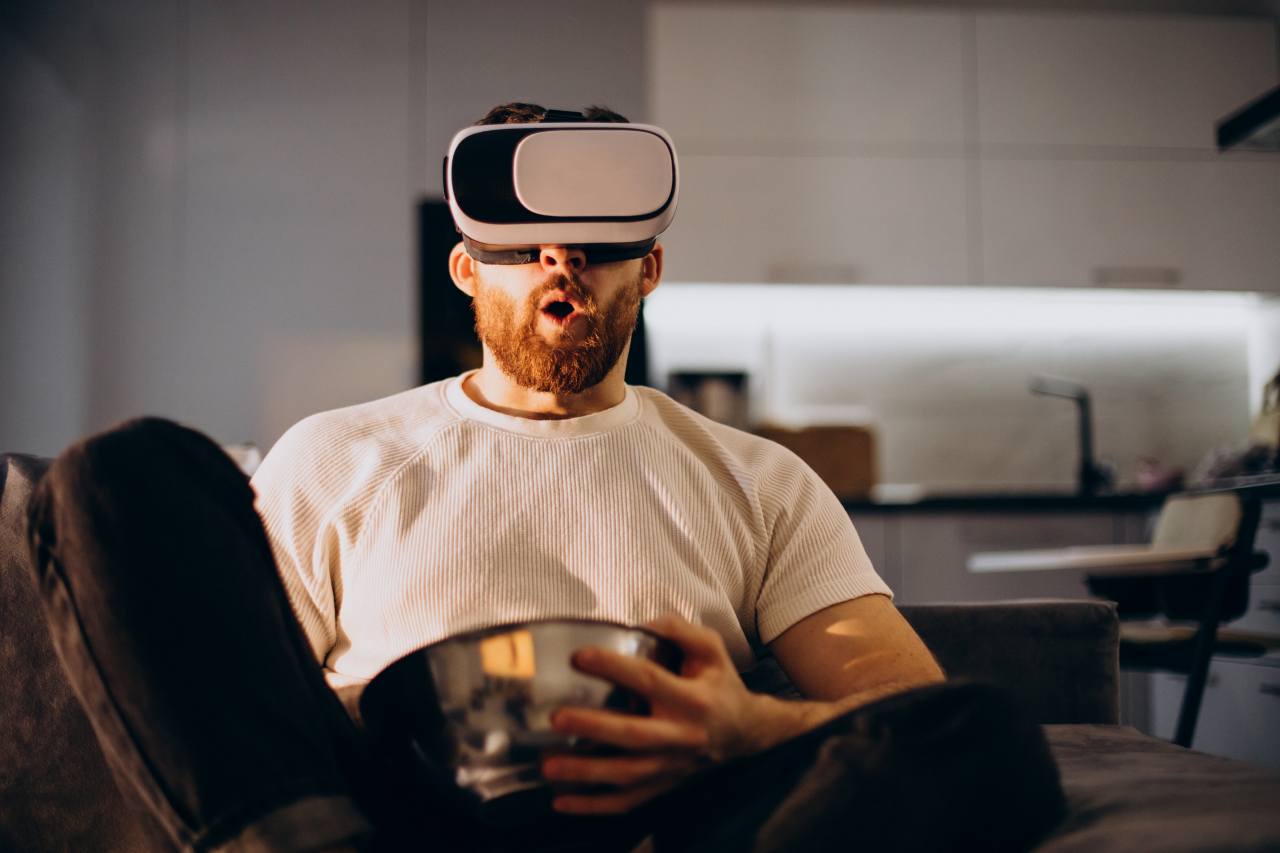 man sitting home using vr