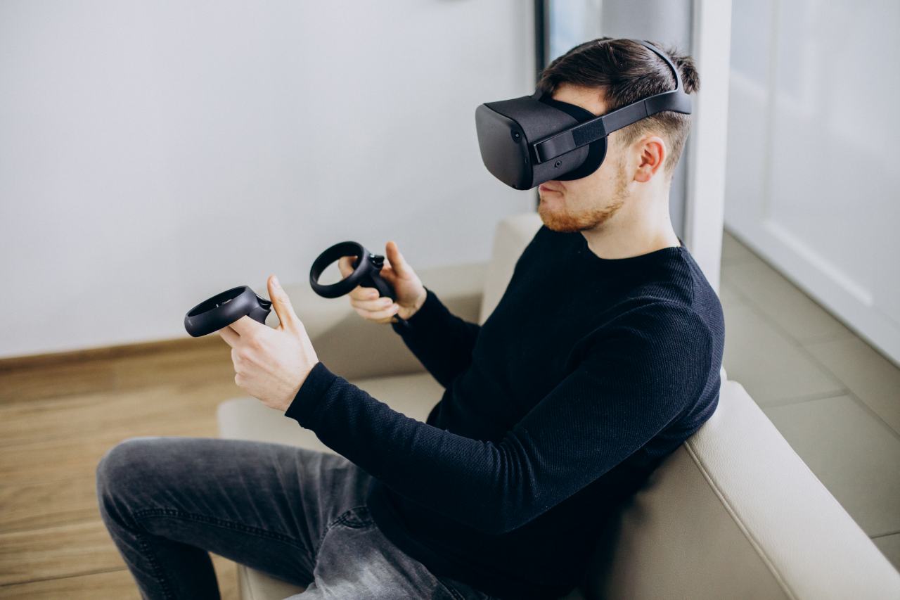 man using playing with vr glasses